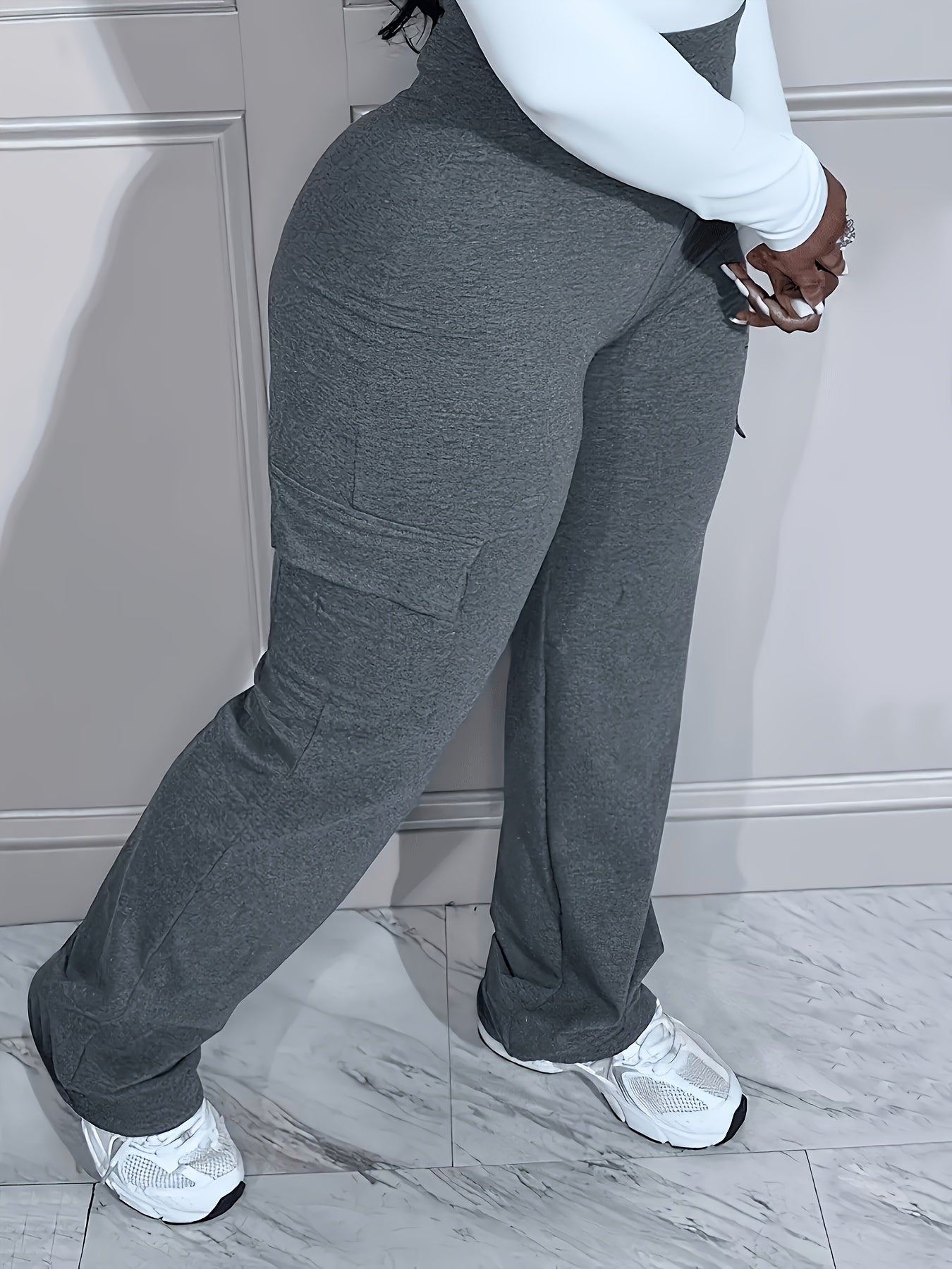 Pantalones de talla grande con bolsillos lisos: cintura alta, comodidad informal y favorecedora