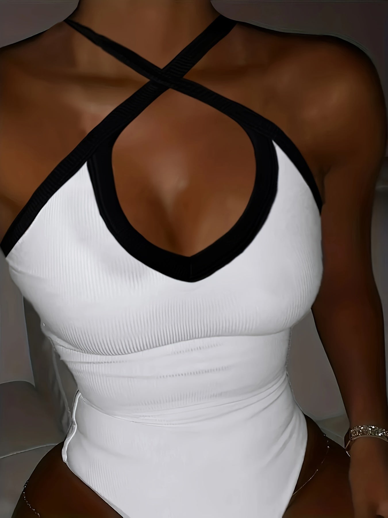 Chic Colorblock Bodysuit with Crisscross Detail - Sleeveless, Figure-Hugging, Ideal for Evening Wear
