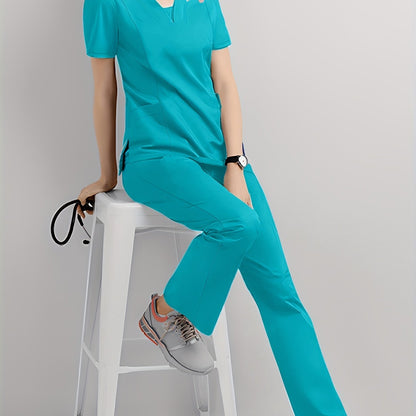 Healthcare professional in turquoise scrubs sitting on a white chair holding a stethoscope.