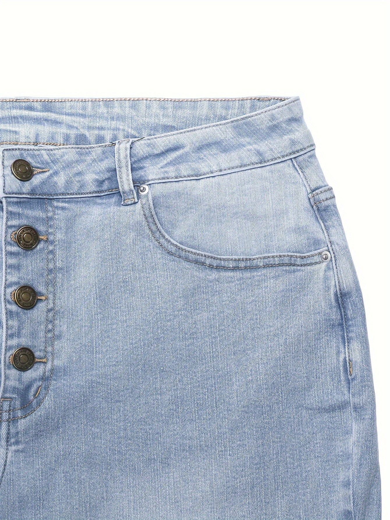 Plus size women's bell-bottom jeans in light blue denim with single-breasted buttons and slight stretch for a comfortable fit.