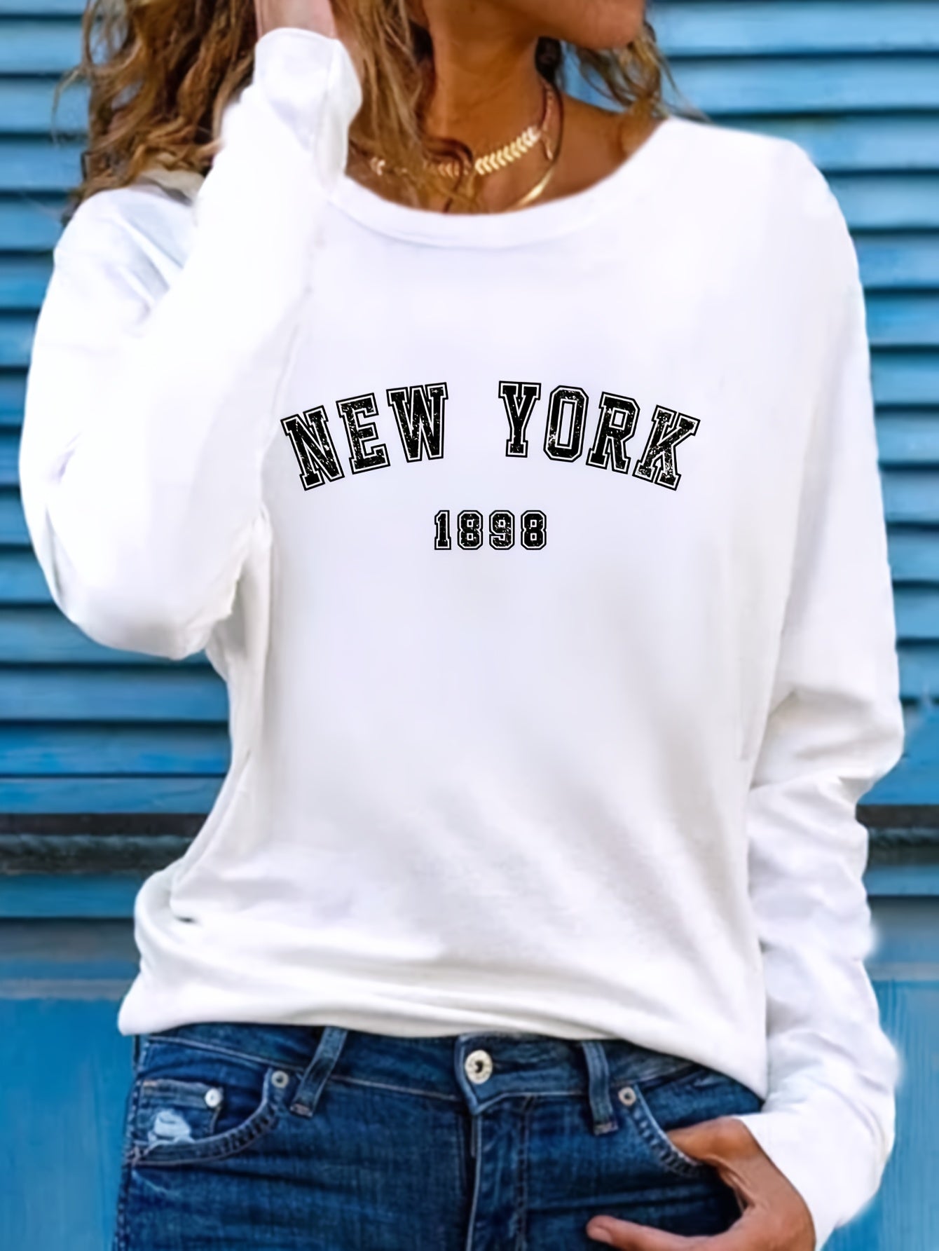 Sudadera elegante con cuello redondo inspirada en Nueva York