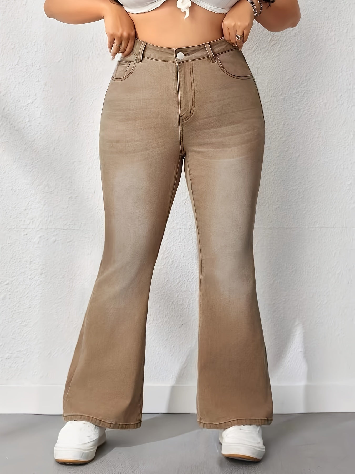 Plus Size Washed Brown Flare Leg High Rise Bell Bottom Jeans for Women, Casual Style Denim with Medium Stretch Fabric.