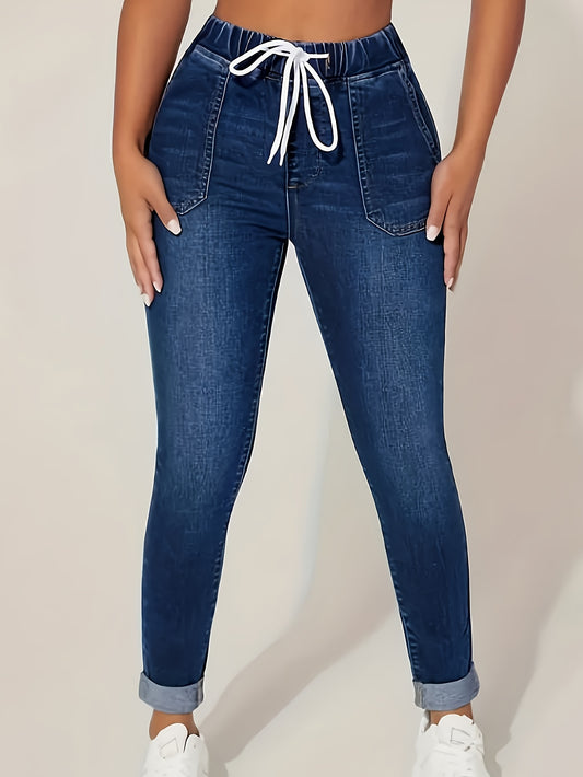 Plus size women's relaxed fit cropped jeans in medium stretch denim with elastic drawstring waist, solid color, perfect for spring, summer, fall.