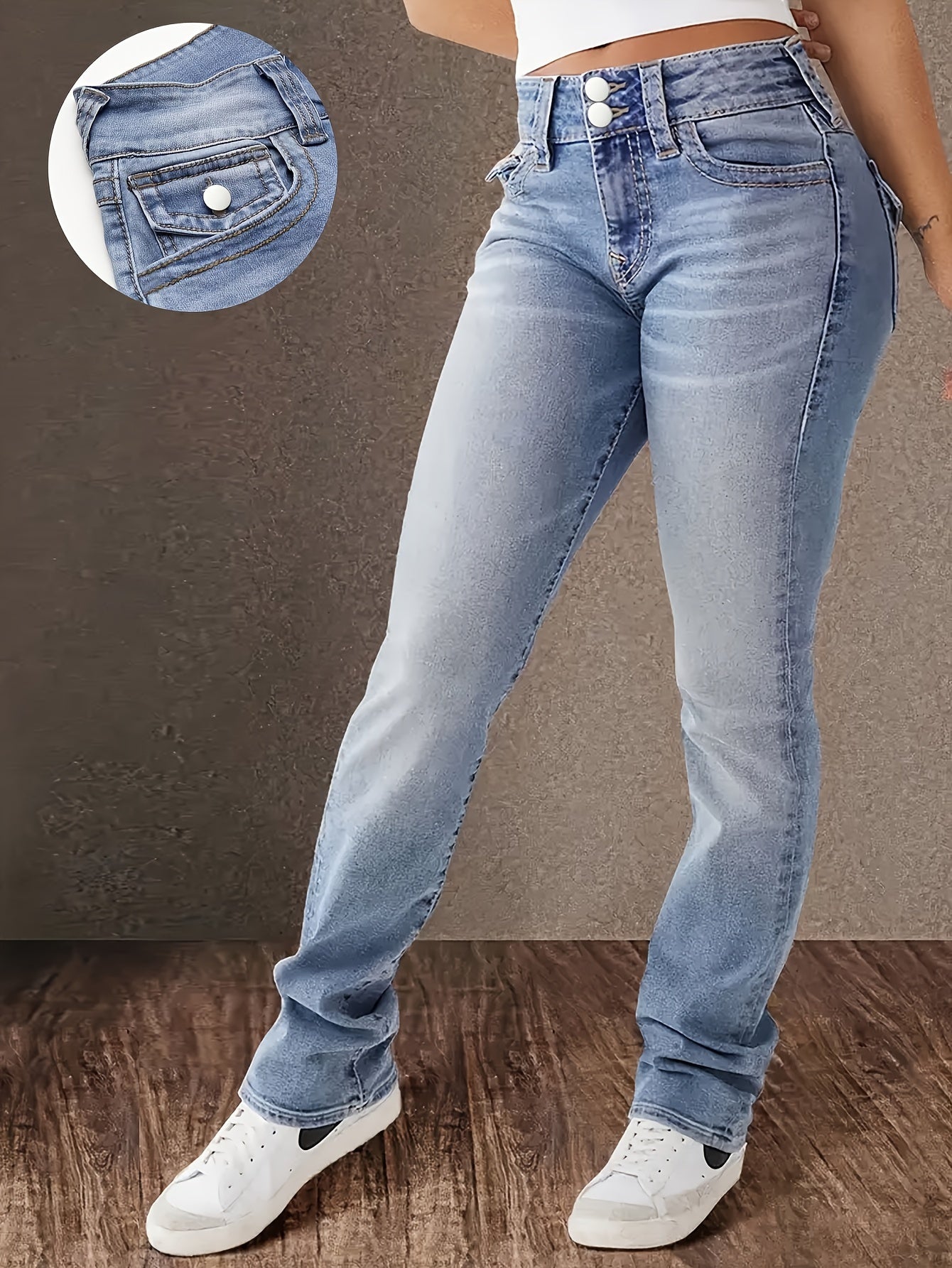 Woman wearing double buttons slim fit washed blue casual zipper button closure denim pants with pocket detail, women's skinny jeans