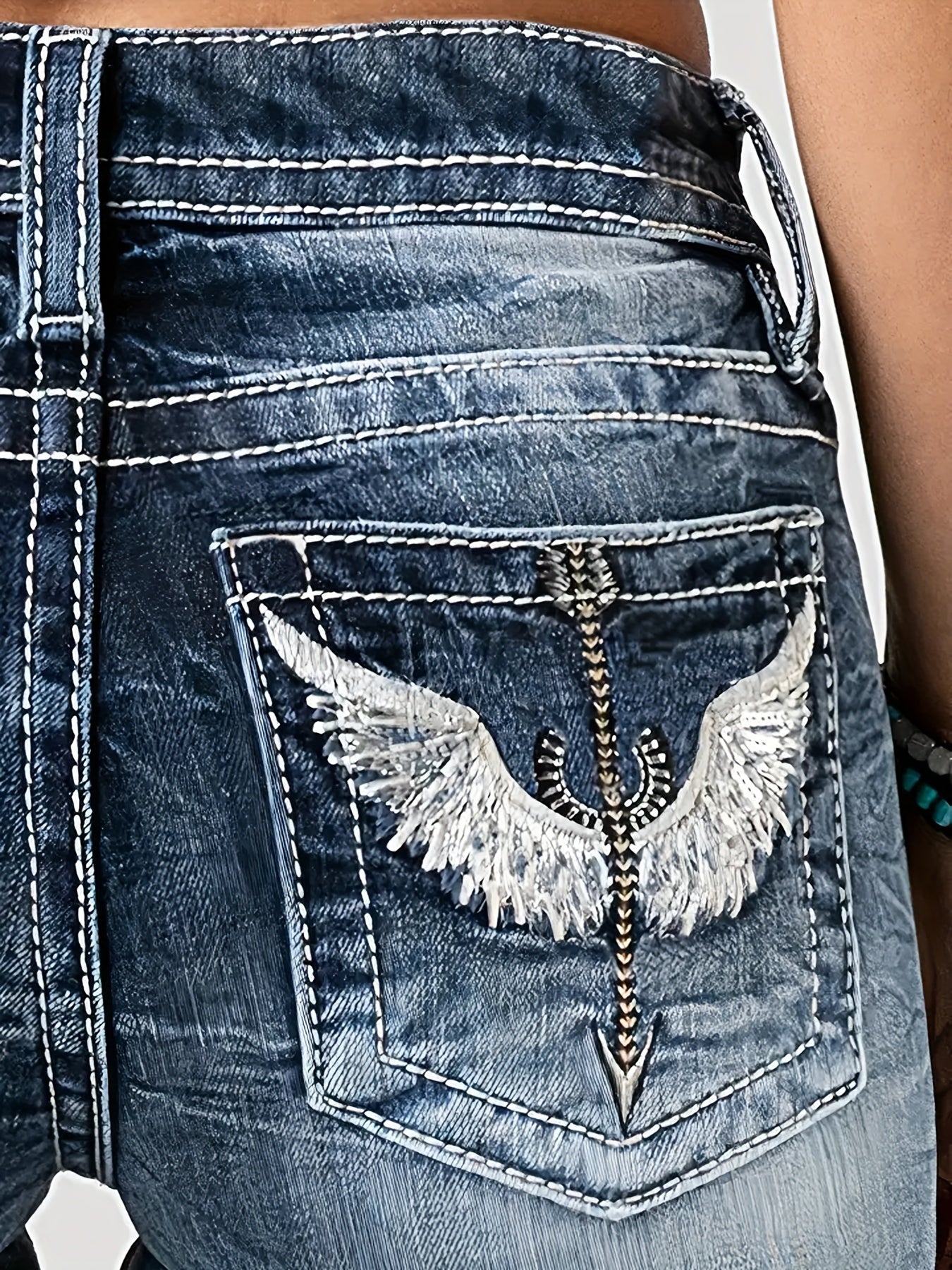 Stylish Blue Wing Embroidered High-Waisted Jeans - LuxyXO