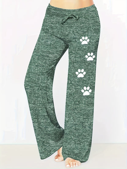 Pantalones anchos y holgados con estampado de huellas de perro