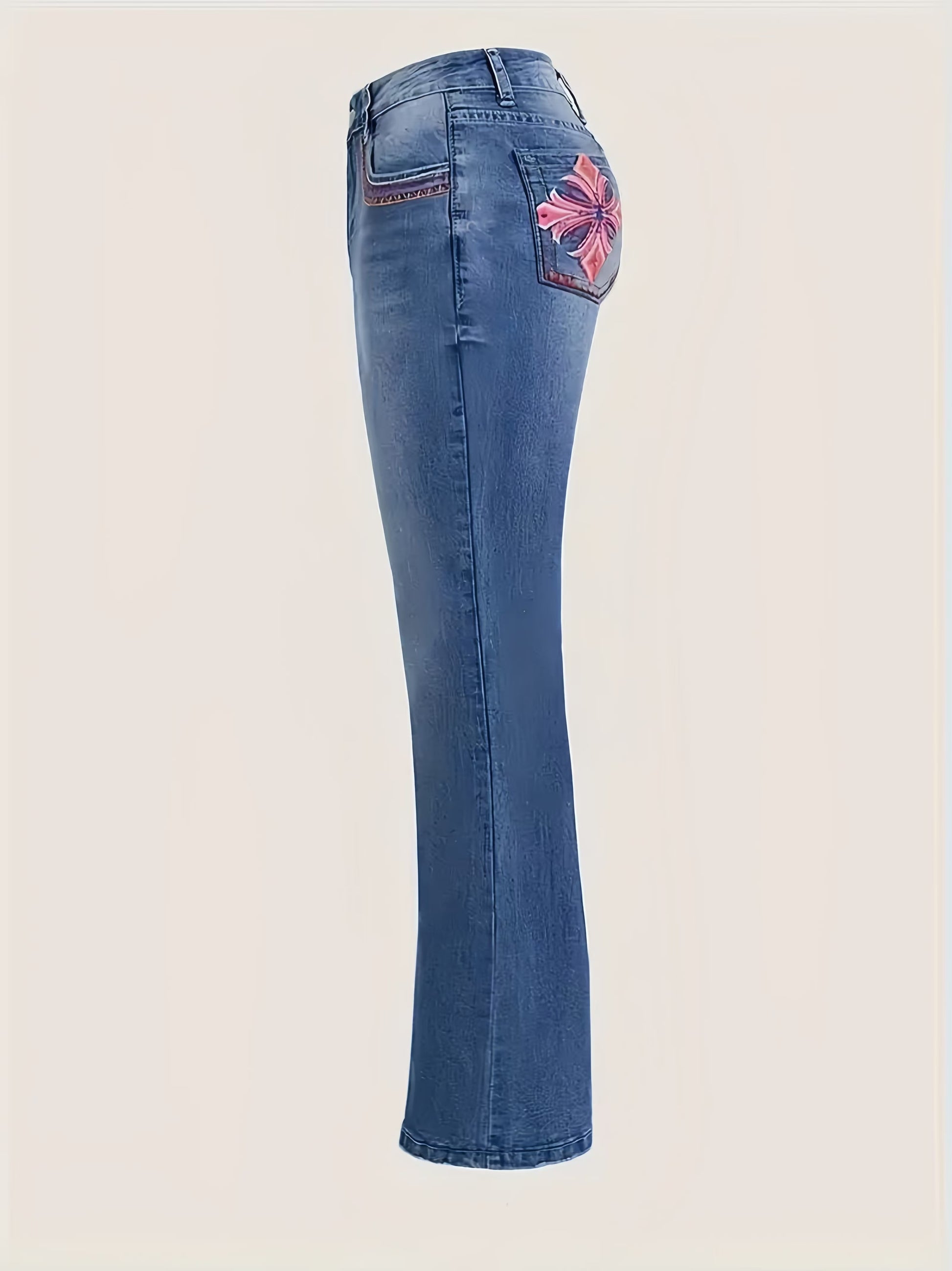 Plus size washed blue flare leg bootcut denim pants with stylish cross embroidery on back pocket, high stretch fabric for curvy figures