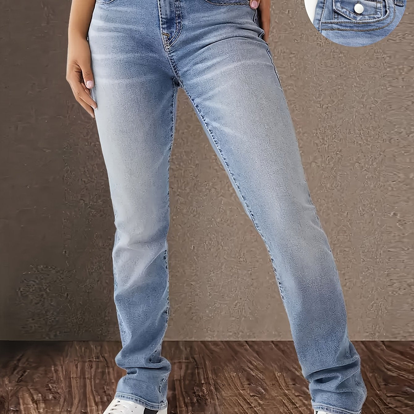 Women's double button slim fit washed blue denim jeans with button fly closure, weekend casual style, medium stretch fabric.