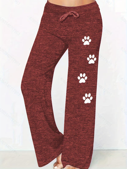 Pantalones anchos y holgados con estampado de huellas de perro