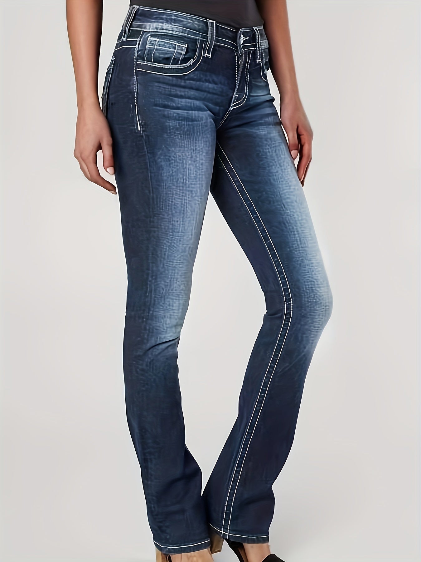 Women's plus size embroidered bell bottom jeans with geometric pattern, casual stretch denim, flared pants for all-season fashion.