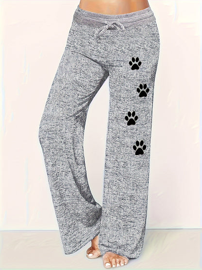 Pantalones anchos y holgados con estampado de huellas de perro