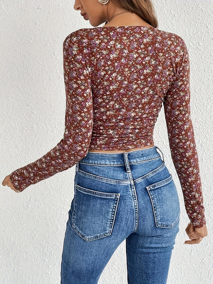 Blusa de escote cuadrado con estampado floral vibrante