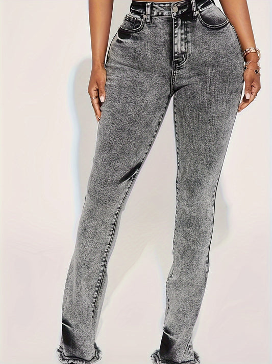 Women's plus size grey wash flare jeans, elastic waist, stretch denim, bell bottoms with frayed hem, casual style.