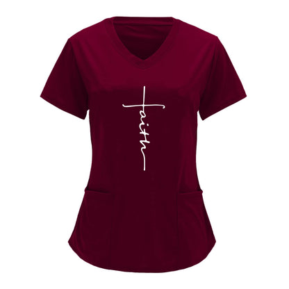 Fashionable womens letter print V-neck scrubs top with patch pockets, short sleeves, and a "faith" graphic in red wine color.