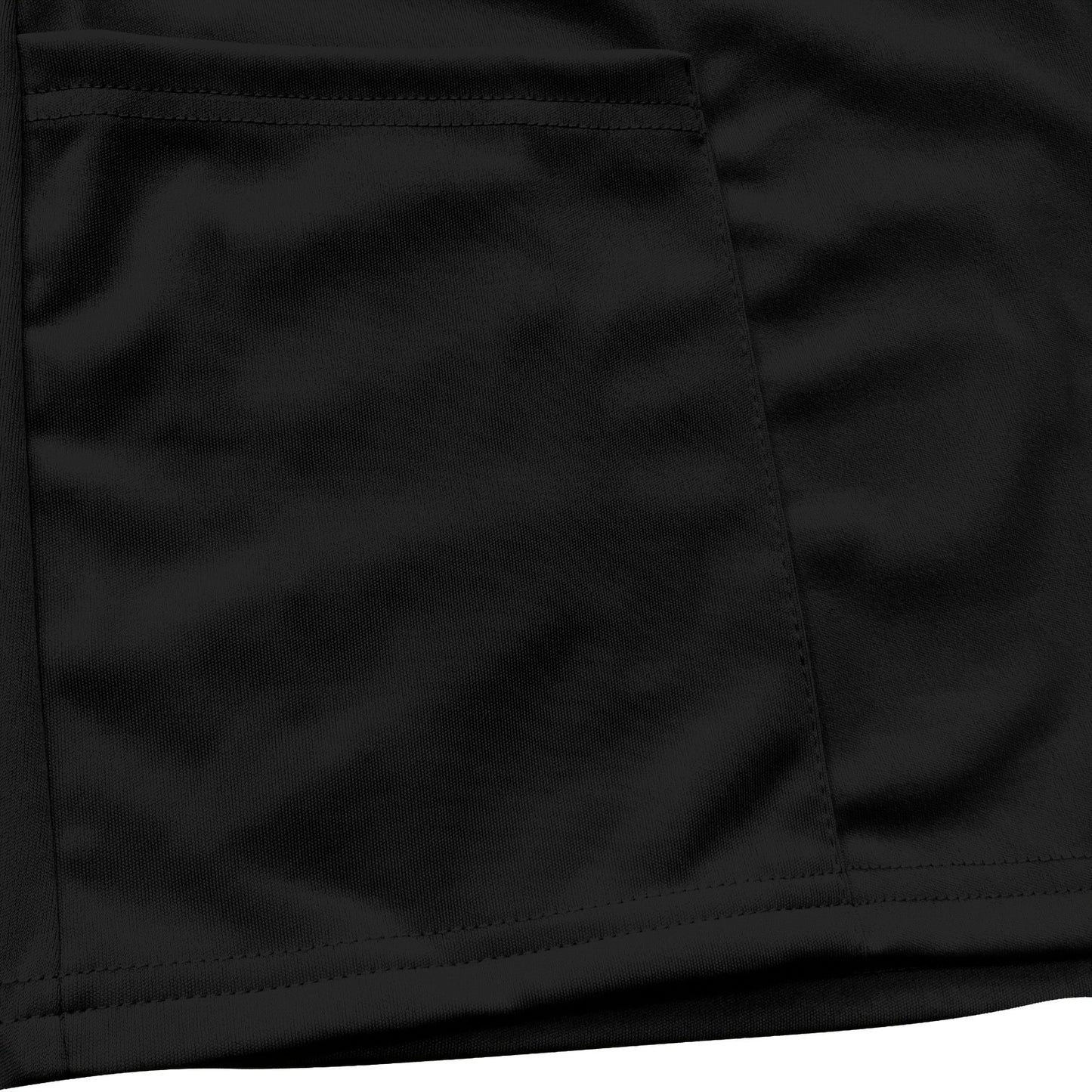 Close-up of black scrubs top with a practical patch pocket for health care professionals, made from mid elasticity polyamide fabric.