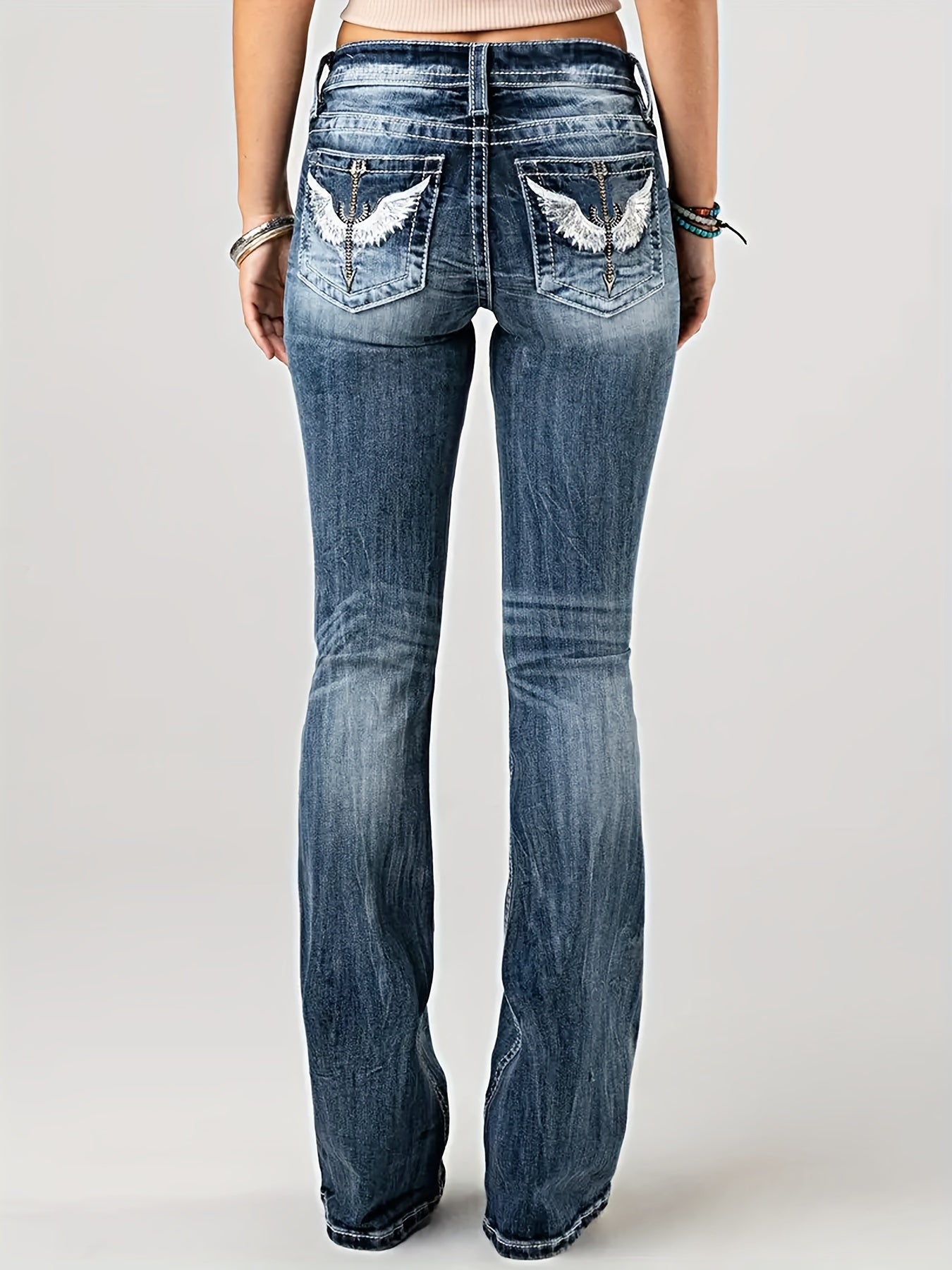 Stylish Blue Wing Embroidered High-Waisted Jeans - LuxyXO