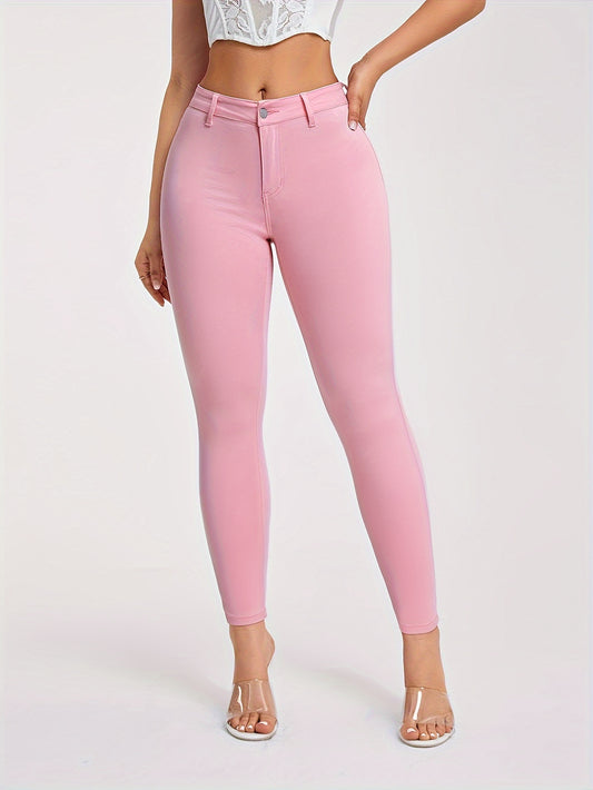 Plus size skinny fit denim pants in pinkish pastel color for women, stretchy jeans with high stretch fabric and comfortable design perfect for curvy figures.