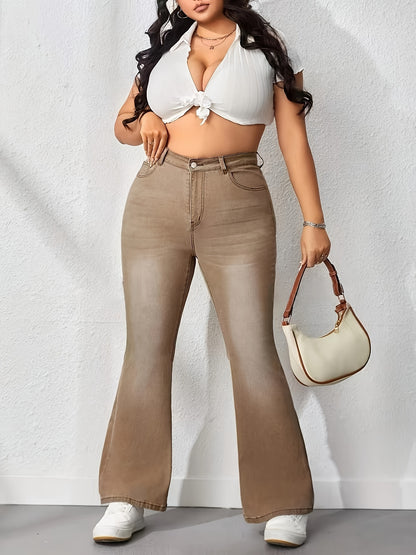 Plus size woman wearing washed brown flare leg high rise bell bottom jeans in casual style, paired with white top and handbag.