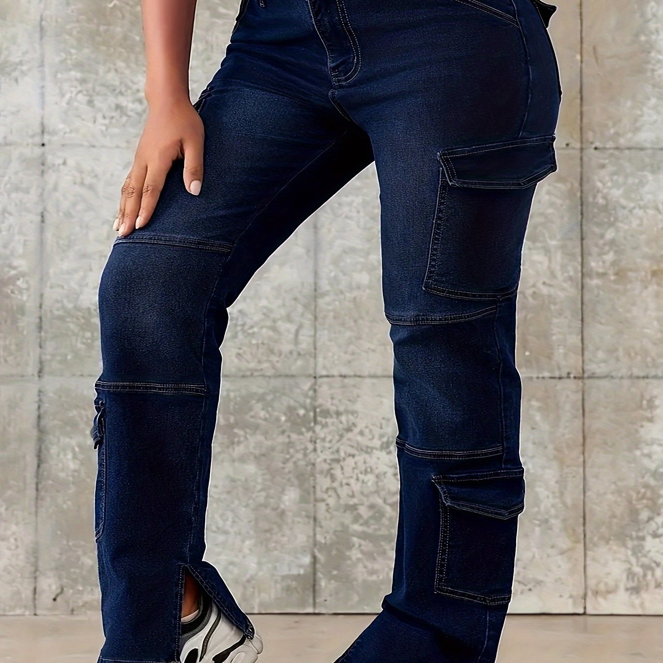 Plus size women's loose-fitting denim jeans with stylish pockets and slight stretch for casual weekend wear.