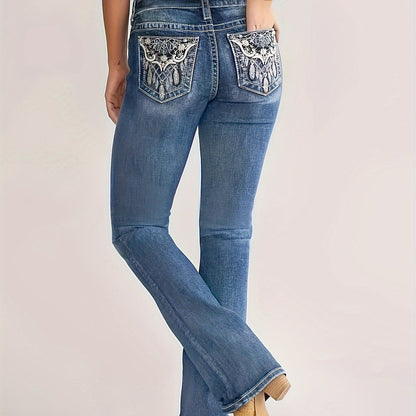 Plus size embroidered pocket washed blue bootcut denim pants for women, high stretch vintage casual style.